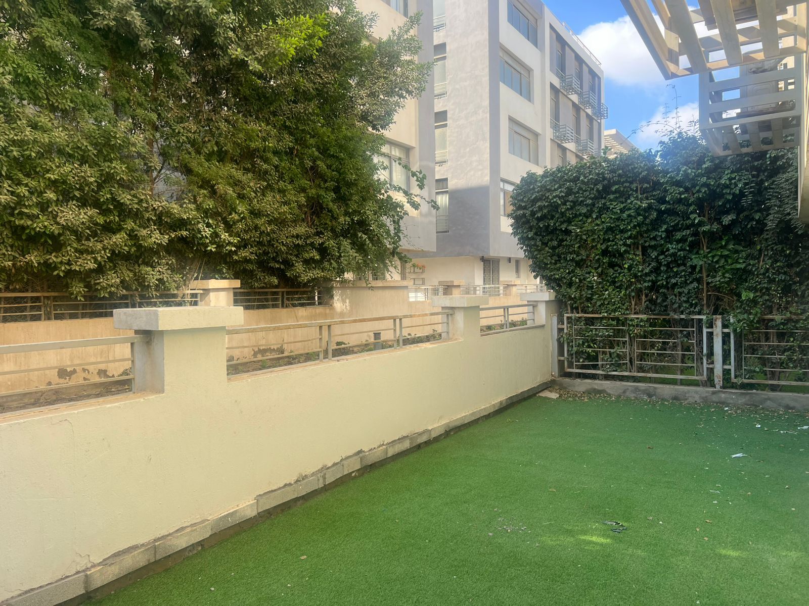 Semi furnished apartment with garden for rent in Taj sultan