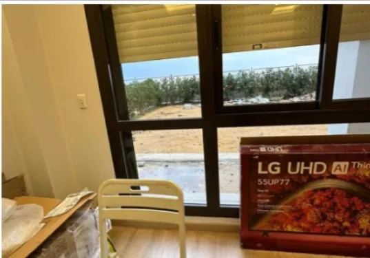 Ground floor apartment with garden for sale in The Address East Compound, New Cairo