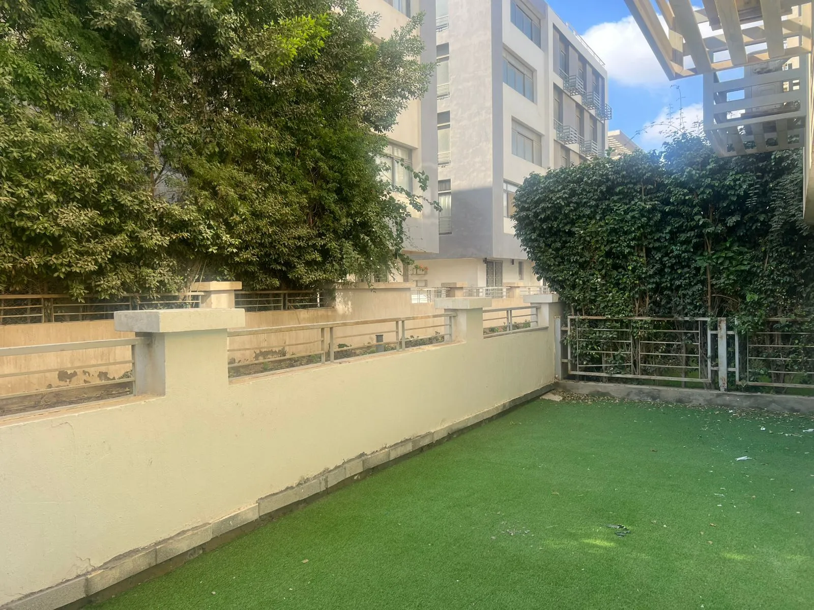Semi furnished apartment with garden for rent in Taj sultan